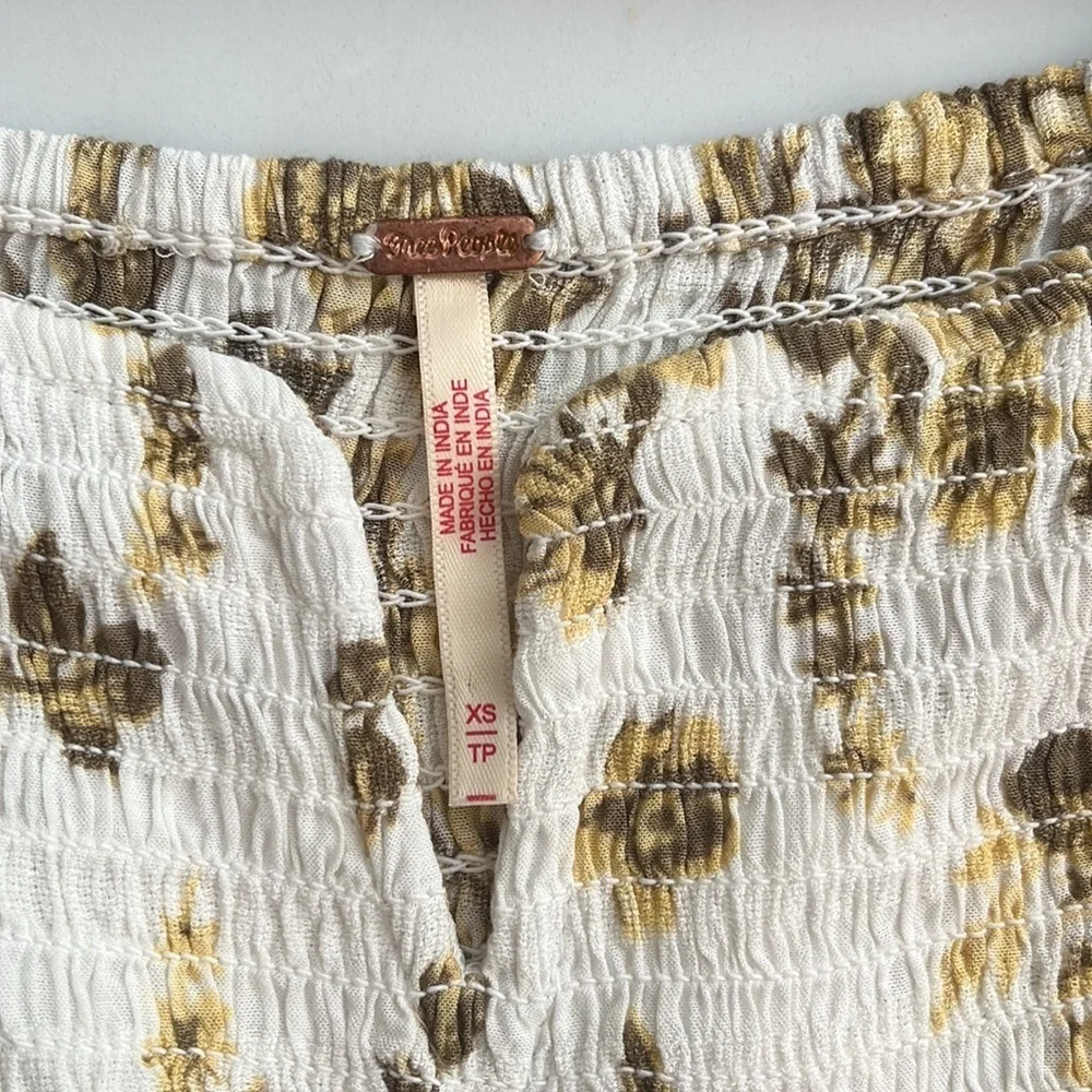 Free People Jaymes Floral Midi Dress in Pastry Cream with balloon sleeves